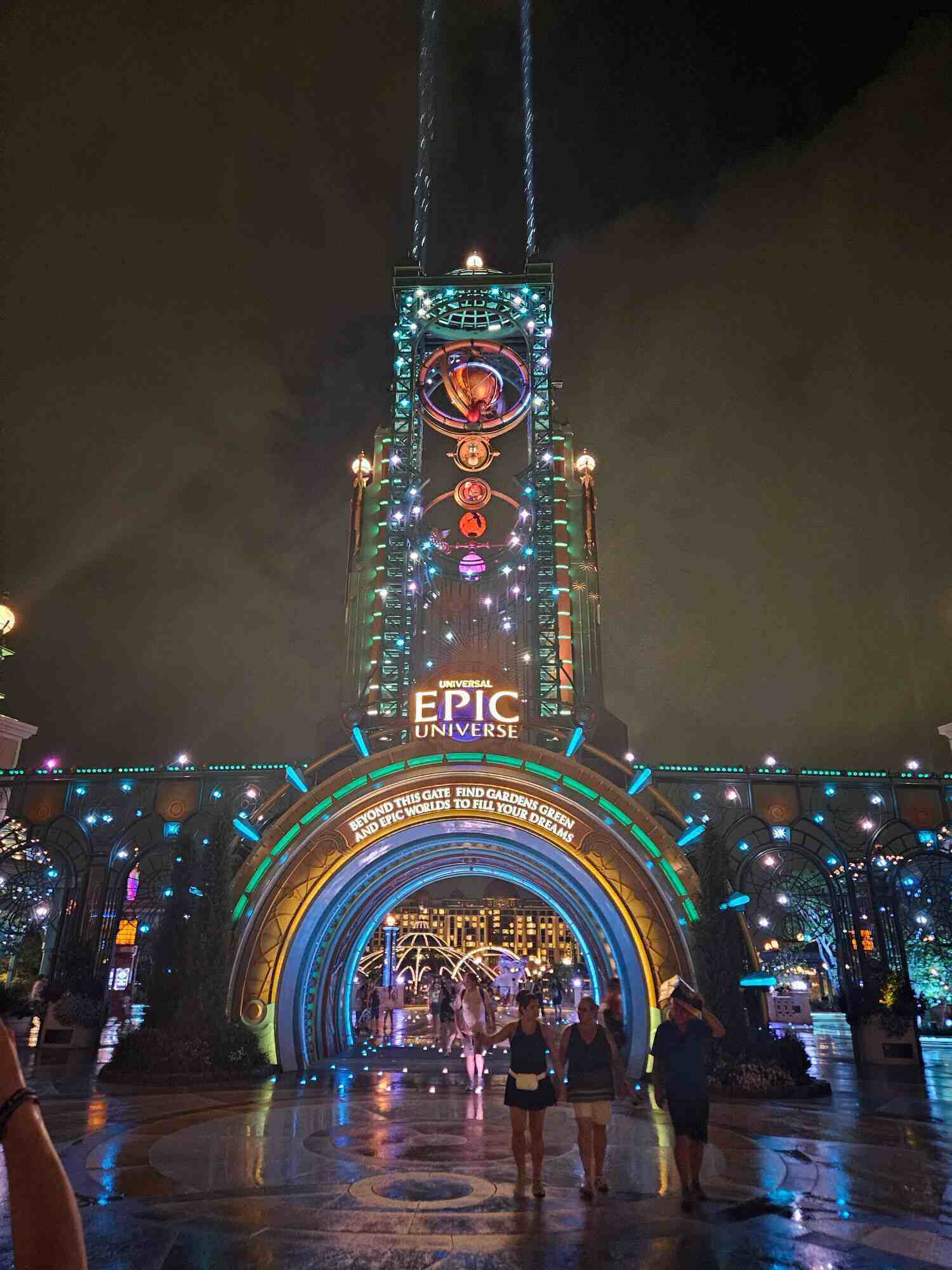 epic universe entrance at night